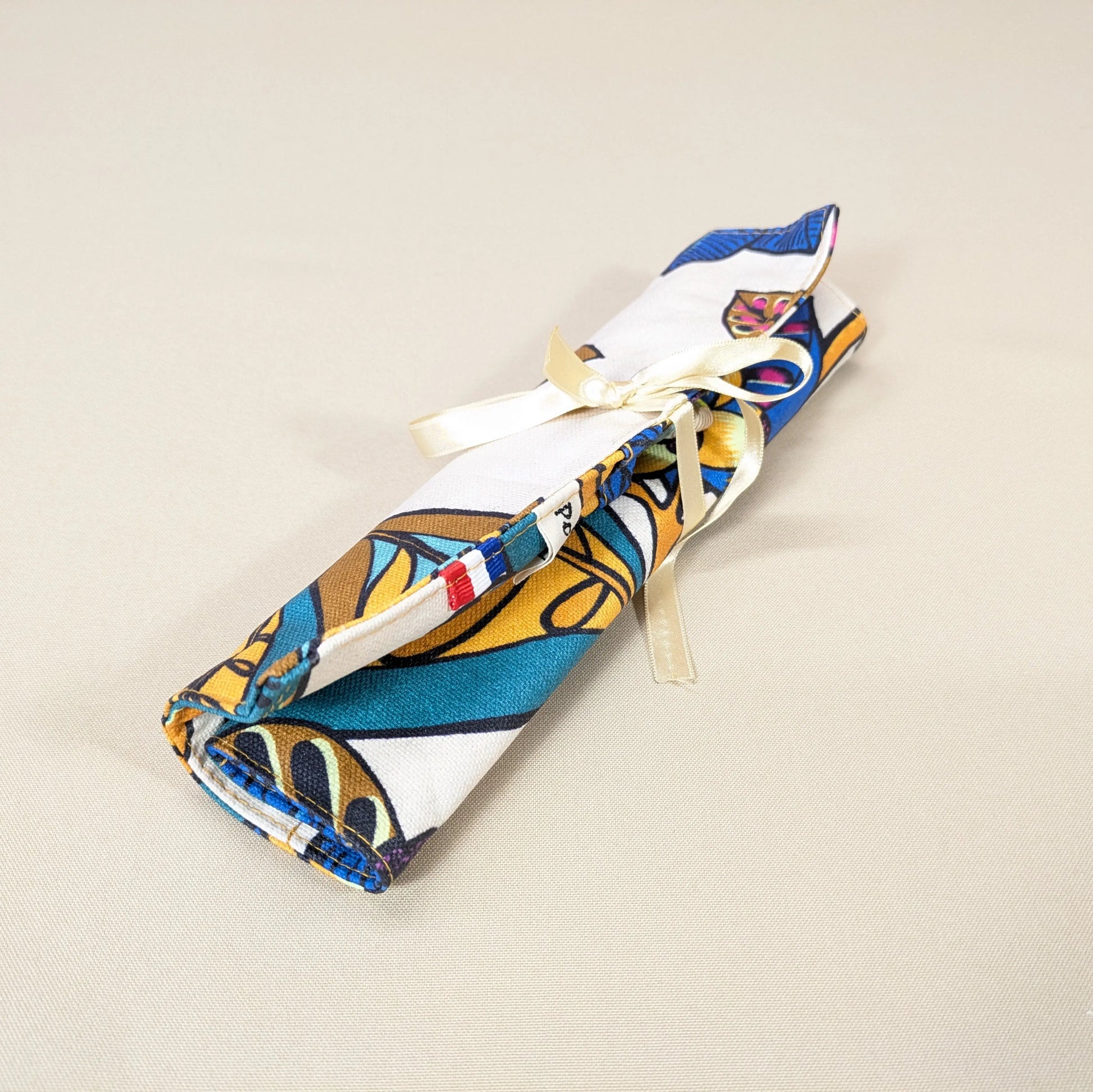 Pochette à couverts, tissu Garden land multicolore fond crème Po'fil